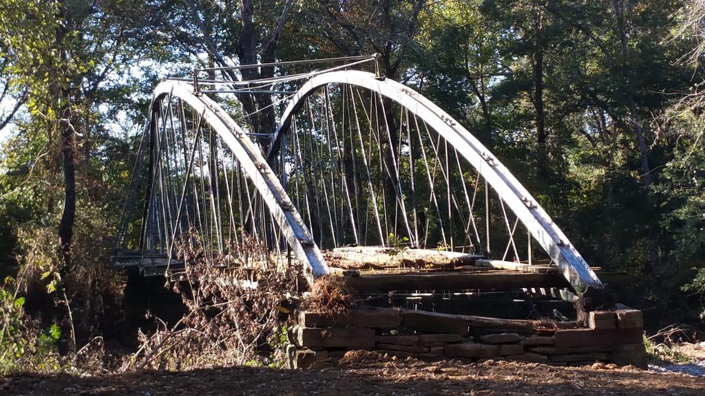 Freshly painted bowstring arches during restoration